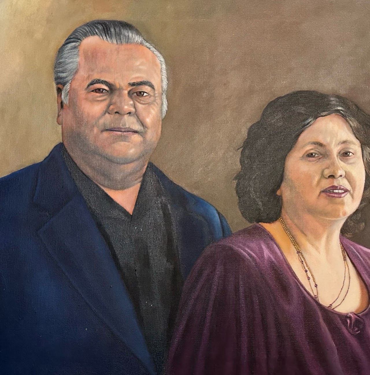 A painted portrait of Leroy and Carmen Vasquez standing together